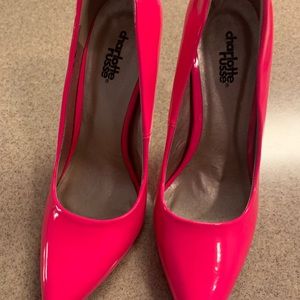 Neon pink patent heels